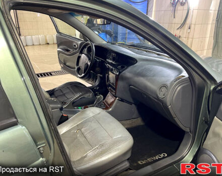 Зеленый Дэу Леганза, объемом двигателя 2 л и пробегом 250 тыс. км за 2100 $, фото 11 на Automoto.ua