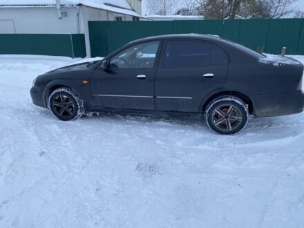 Чорний Деу Магнус, об'ємом двигуна 2 л та пробігом 360 тис. км за 1710 $, фото 1 на Automoto.ua