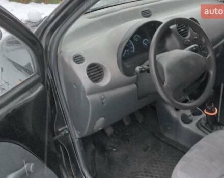 Черный Дэу Матиз, объемом двигателя 0.8 л и пробегом 115 тыс. км за 1800 $, фото 2 на Automoto.ua