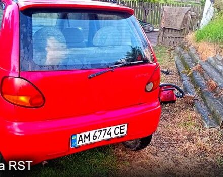 Красный Дэу Матиз, объемом двигателя 0.8 л и пробегом 123 тыс. км за 1000 $, фото 2 на Automoto.ua