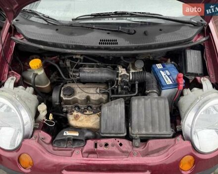 Красный Дэу Матиз, объемом двигателя 0.8 л и пробегом 111 тыс. км за 2000 $, фото 2 на Automoto.ua