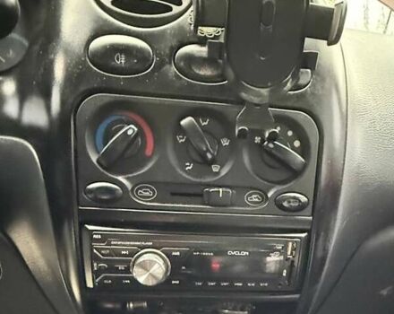 Красный Дэу Матиз, объемом двигателя 0.8 л и пробегом 111 тыс. км за 2000 $, фото 4 на Automoto.ua