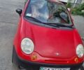 Красный Дэу Матиз, объемом двигателя 0.8 л и пробегом 165 тыс. км за 1300 $, фото 1 на Automoto.ua