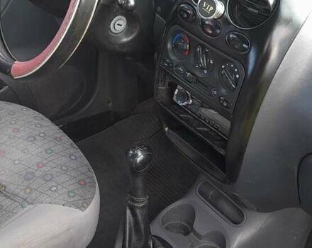 Червоний Деу Матіз, об'ємом двигуна 0.8 л та пробігом 180 тис. км за 2000 $, фото 6 на Automoto.ua