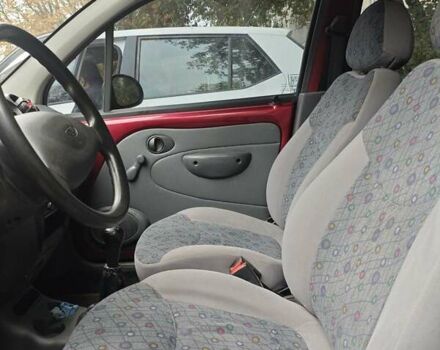 Красный Дэу Матиз, объемом двигателя 0.8 л и пробегом 125 тыс. км за 1800 $, фото 7 на Automoto.ua