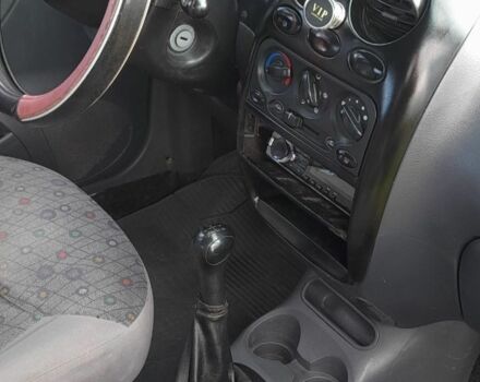 Червоний Деу Матіз, об'ємом двигуна 0.8 л та пробігом 180 тис. км за 2000 $, фото 6 на Automoto.ua