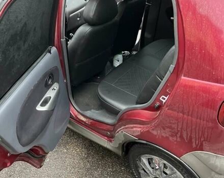 Красный Дэу Матиз, объемом двигателя 0.8 л и пробегом 165 тыс. км за 1700 $, фото 1 на Automoto.ua