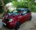 Красный Дэу Матиз, объемом двигателя 0.8 л и пробегом 106 тыс. км за 2250 $, фото 1 на Automoto.ua