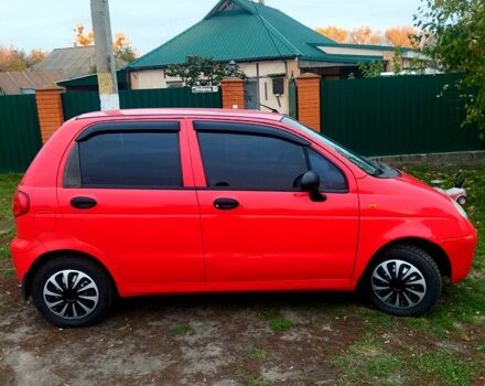 Красный Дэу Матиз, объемом двигателя 0.8 л и пробегом 98 тыс. км за 2150 $, фото 1 на Automoto.ua