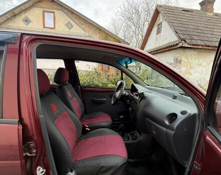 Червоний Деу Матіз, об'ємом двигуна 0.8 л та пробігом 107 тис. км за 2000 $, фото 16 на Automoto.ua