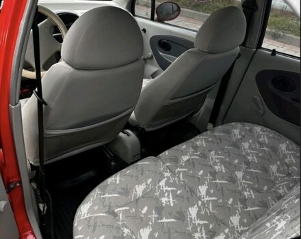 Красный Дэу Матиз, объемом двигателя 1.1 л и пробегом 90 тыс. км за 1950 $, фото 4 на Automoto.ua