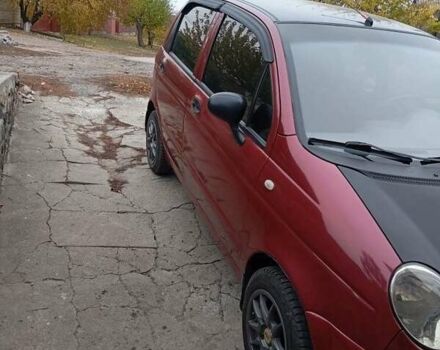 Красный Дэу Матиз, объемом двигателя 0.8 л и пробегом 120 тыс. км за 2000 $, фото 1 на Automoto.ua