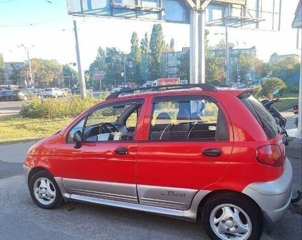 Красный Дэу Матиз, объемом двигателя 1 л и пробегом 99 тыс. км за 3200 $, фото 1 на Automoto.ua