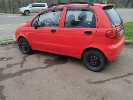 Красный Дэу Матиз, объемом двигателя 0.8 л и пробегом 106 тыс. км за 1800 $, фото 1 на Automoto.ua