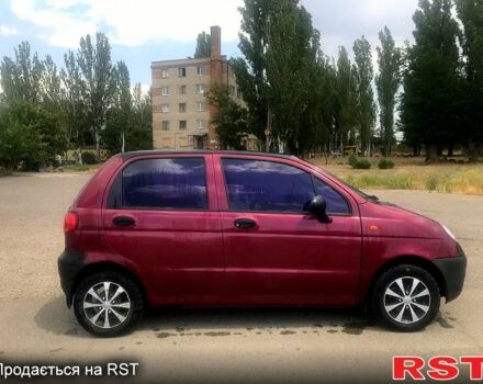 Красный Дэу Матиз, объемом двигателя 0.8 л и пробегом 200 тыс. км за 1900 $, фото 1 на Automoto.ua