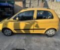 Желтый Дэу Матиз, объемом двигателя 0.8 л и пробегом 135 тыс. км за 4000 $, фото 1 на Automoto.ua