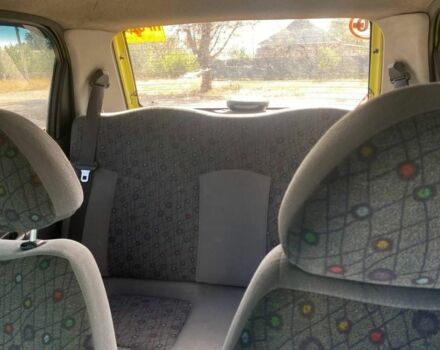 Желтый Дэу Матиз, объемом двигателя 0.8 л и пробегом 112 тыс. км за 1800 $, фото 4 на Automoto.ua