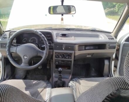 Білий Деу Нексія, об'ємом двигуна 1.5 л та пробігом 220 тис. км за 1410 $, фото 4 на Automoto.ua