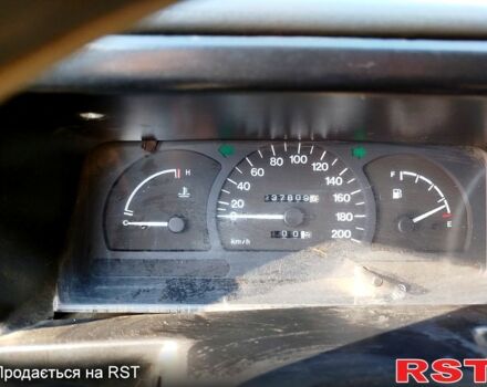 Белый Дэу Нексия, объемом двигателя 1.5 л и пробегом 243 тыс. км за 1650 $, фото 1 на Automoto.ua
