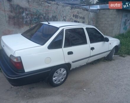 Белый Дэу Нексия, объемом двигателя 1.5 л и пробегом 200 тыс. км за 1899 $, фото 4 на Automoto.ua