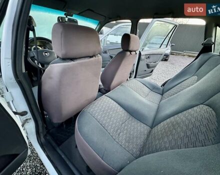 Белый Дэу Нексия, объемом двигателя 1.5 л и пробегом 209 тыс. км за 2399 $, фото 24 на Automoto.ua