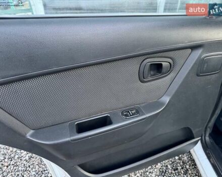 Белый Дэу Нексия, объемом двигателя 1.5 л и пробегом 209 тыс. км за 2399 $, фото 23 на Automoto.ua