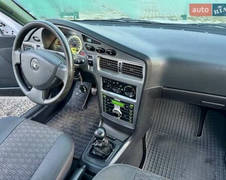 Белый Дэу Нексия, объемом двигателя 1.5 л и пробегом 209 тыс. км за 2399 $, фото 32 на Automoto.ua