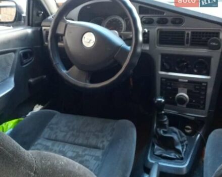 Белый Дэу Нексия, объемом двигателя 1.6 л и пробегом 325 тыс. км за 1300 $, фото 3 на Automoto.ua