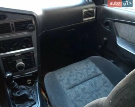 Белый Дэу Нексия, объемом двигателя 1.6 л и пробегом 325 тыс. км за 1300 $, фото 4 на Automoto.ua