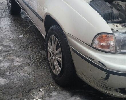 Білий Деу Нексія, об'ємом двигуна 1.5 л та пробігом 112 тис. км за 1300 $, фото 1 на Automoto.ua