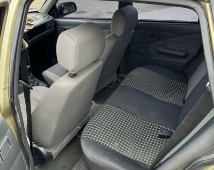 Бежевий Деу Нексія, об'ємом двигуна 1.5 л та пробігом 178 тис. км за 1500 $, фото 7 на Automoto.ua