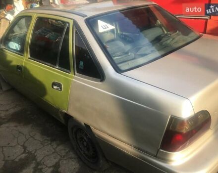 Бежевый Дэу Нексия, объемом двигателя 1.5 л и пробегом 310 тыс. км за 1065 $, фото 3 на Automoto.ua