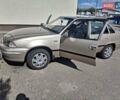 Бежевий Деу Нексія, об'ємом двигуна 1.5 л та пробігом 274 тис. км за 1000 $, фото 1 на Automoto.ua