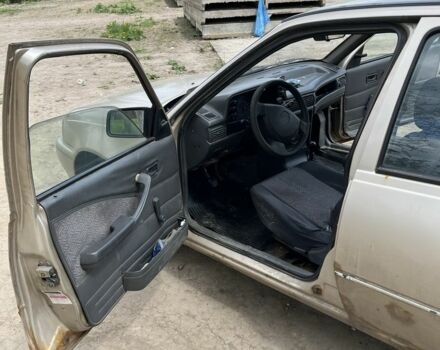 Бежевий Деу Нексія, об'ємом двигуна 1.6 л та пробігом 200 тис. км за 1200 $, фото 5 на Automoto.ua