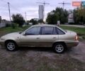 Бежевий Деу Нексія, об'ємом двигуна 1.5 л та пробігом 228 тис. км за 1200 $, фото 4 на Automoto.ua