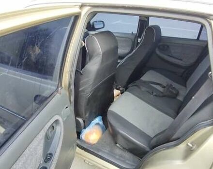 Бежевый Дэу Нексия, объемом двигателя 1.5 л и пробегом 230 тыс. км за 500 $, фото 2 на Automoto.ua