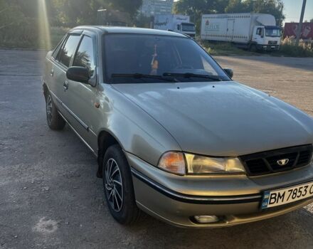 Бежевый Дэу Нексия, объемом двигателя 1.5 л и пробегом 263 тыс. км за 1450 $, фото 2 на Automoto.ua