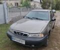 Бежевий Деу Нексія, об'ємом двигуна 1.5 л та пробігом 255 тис. км за 1004 $, фото 1 на Automoto.ua