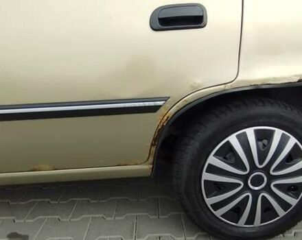 Бежевый Дэу Нексия, объемом двигателя 1.5 л и пробегом 230 тыс. км за 500 $, фото 9 на Automoto.ua