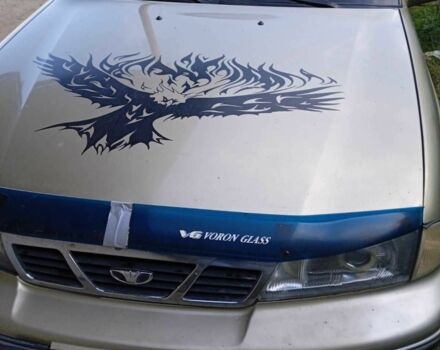 Бежевий Деу Нексія, об'ємом двигуна 1.5 л та пробігом 250 тис. км за 900 $, фото 1 на Automoto.ua