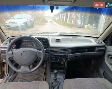 Бежевый Дэу Нексия, объемом двигателя 1.5 л и пробегом 277 тыс. км за 1000 $, фото 2 на Automoto.ua