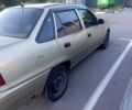 Бежевый Дэу Нексия, объемом двигателя 1.5 л и пробегом 300 тыс. км за 482 $, фото 1 на Automoto.ua