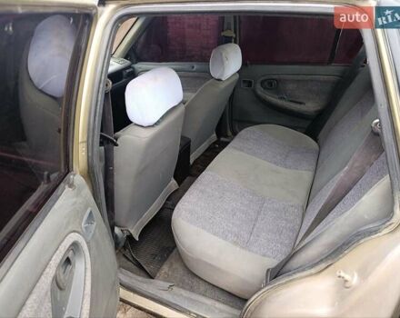 Бежевый Дэу Нексия, объемом двигателя 1.5 л и пробегом 277 тыс. км за 1000 $, фото 3 на Automoto.ua