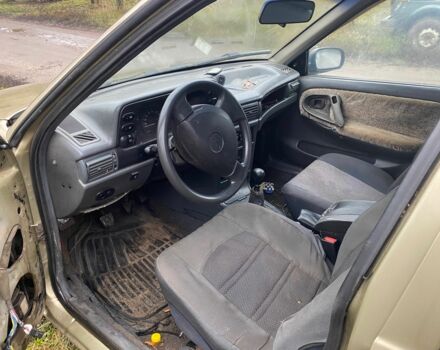 Бежевий Деу Нексія, об'ємом двигуна 1.5 л та пробігом 240 тис. км за 900 $, фото 4 на Automoto.ua