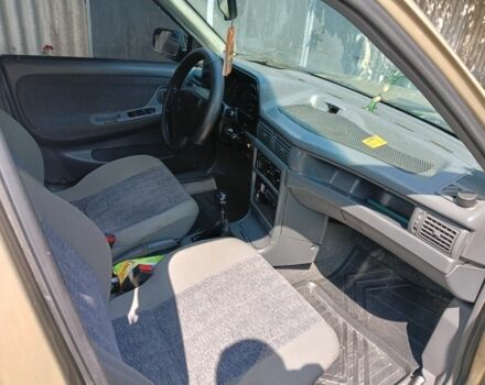 Бежевий Деу Нексія, об'ємом двигуна 1.5 л та пробігом 203 тис. км за 1650 $, фото 5 на Automoto.ua