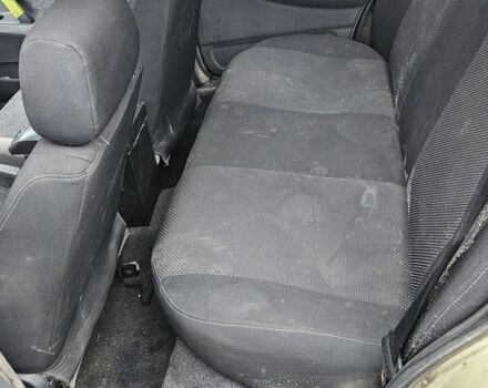 Бежевый Дэу Нексия, объемом двигателя 1.5 л и пробегом 234 тыс. км за 1150 $, фото 4 на Automoto.ua