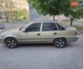 Бежевый Дэу Нексия, объемом двигателя 1.5 л и пробегом 158 тыс. км за 2100 $, фото 2 на Automoto.ua
