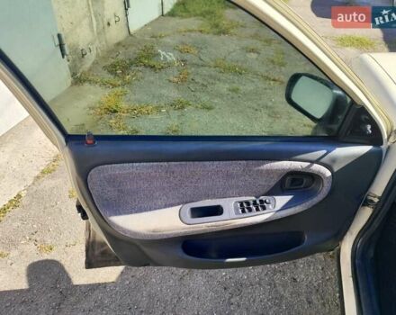 Бежевий Деу Нексія, об'ємом двигуна 1.6 л та пробігом 205 тис. км за 1600 $, фото 11 на Automoto.ua