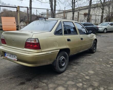 Бежевый Дэу Нексия, объемом двигателя 1.5 л и пробегом 234 тыс. км за 1150 $, фото 3 на Automoto.ua