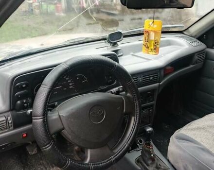 Бежевий Деу Нексія, об'ємом двигуна 1.5 л та пробігом 277 тис. км за 999 $, фото 1 на Automoto.ua